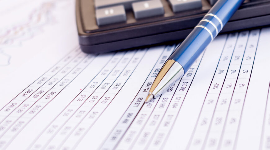 financial accounting with documents pen calculator concept business finance Что проверяет система управления рисками (СУР)